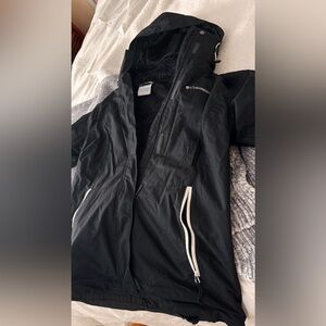 Columbia snow jacket. Worn skiing. Keeps you super warm with just one layer